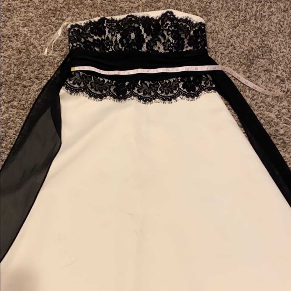 Amazing dress, needs to be taken out on a stroll!